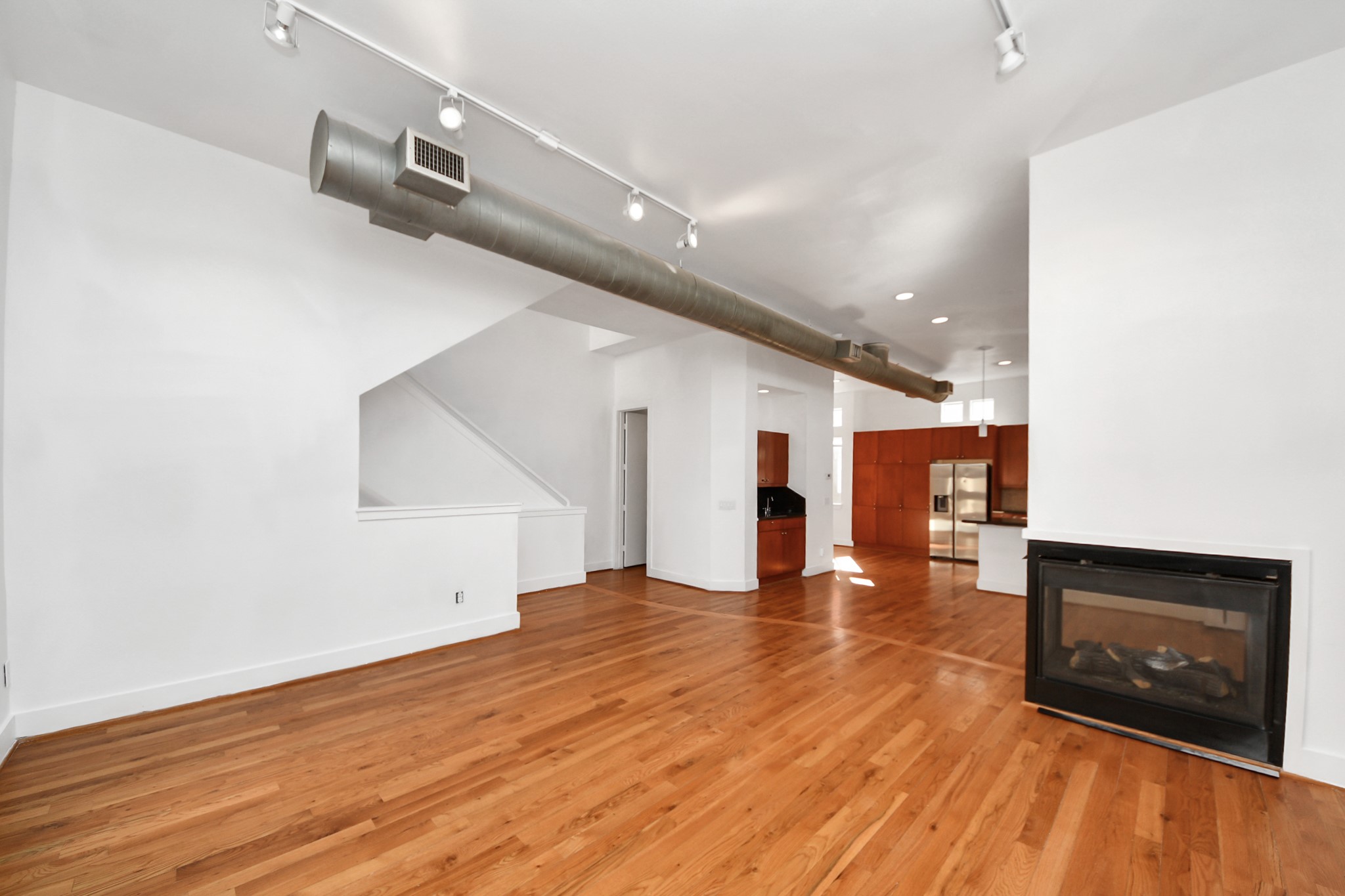 2436 Bissonnet Street, Unit 8 Houston, TX 77005 - Photo 14 of 42 a view of a room with wooden floor
