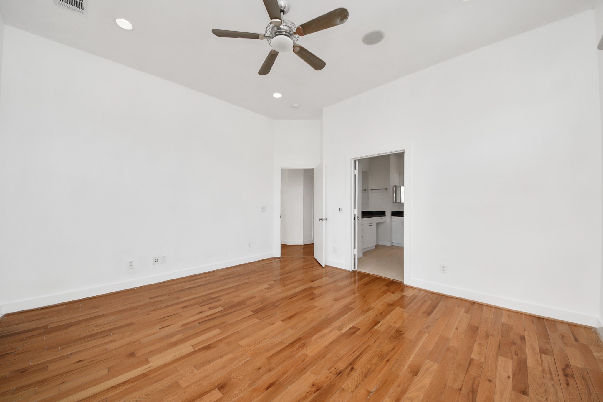 2436 Bissonnet Street, Unit 8 Houston, TX 77005 - Photo 28 of 42 a view of empty room with wooden floor