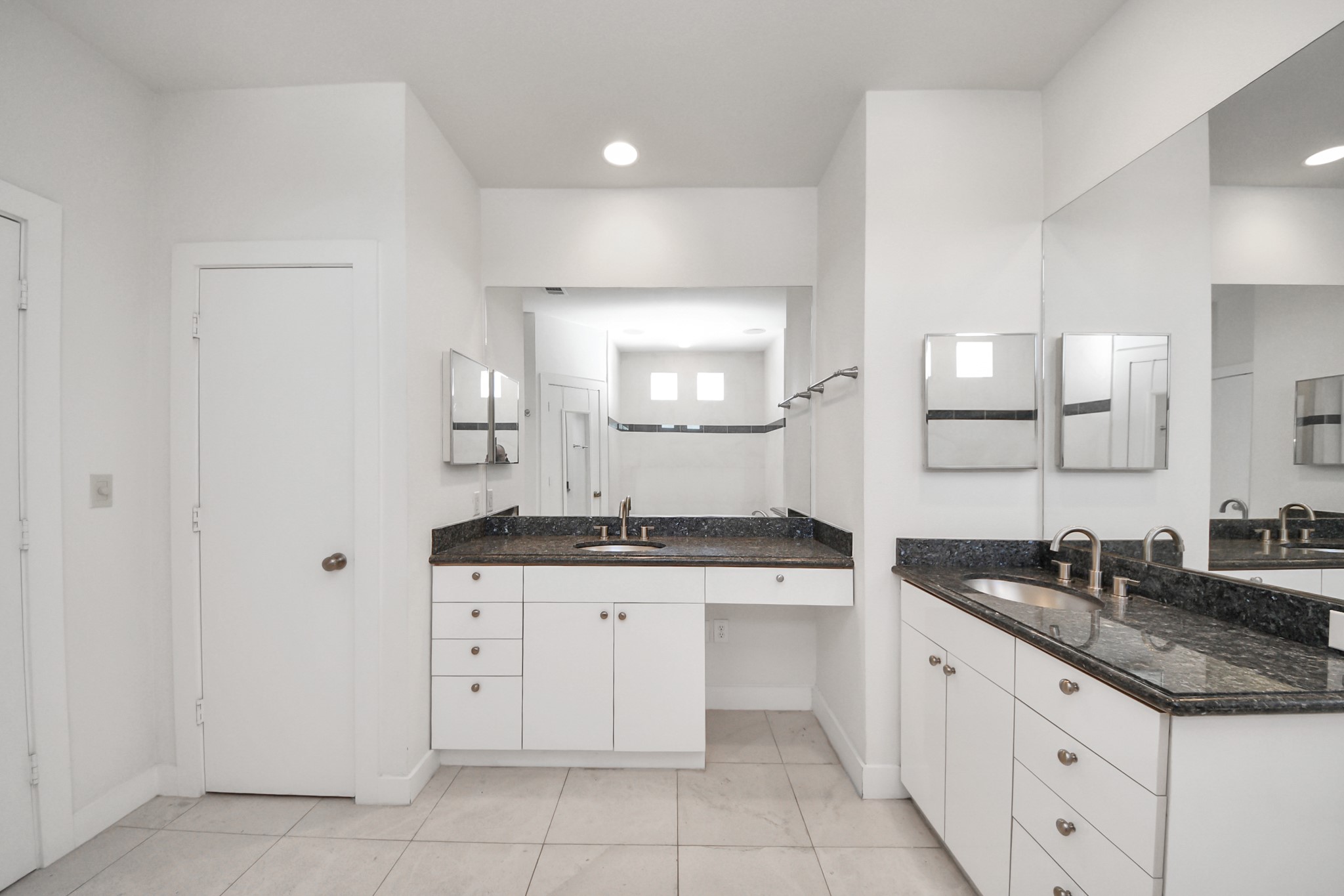2436 Bissonnet Street, Unit 8 Houston, TX 77005 - Photo 33 of 42 a kitchen with granite countertop a sink and cabinets