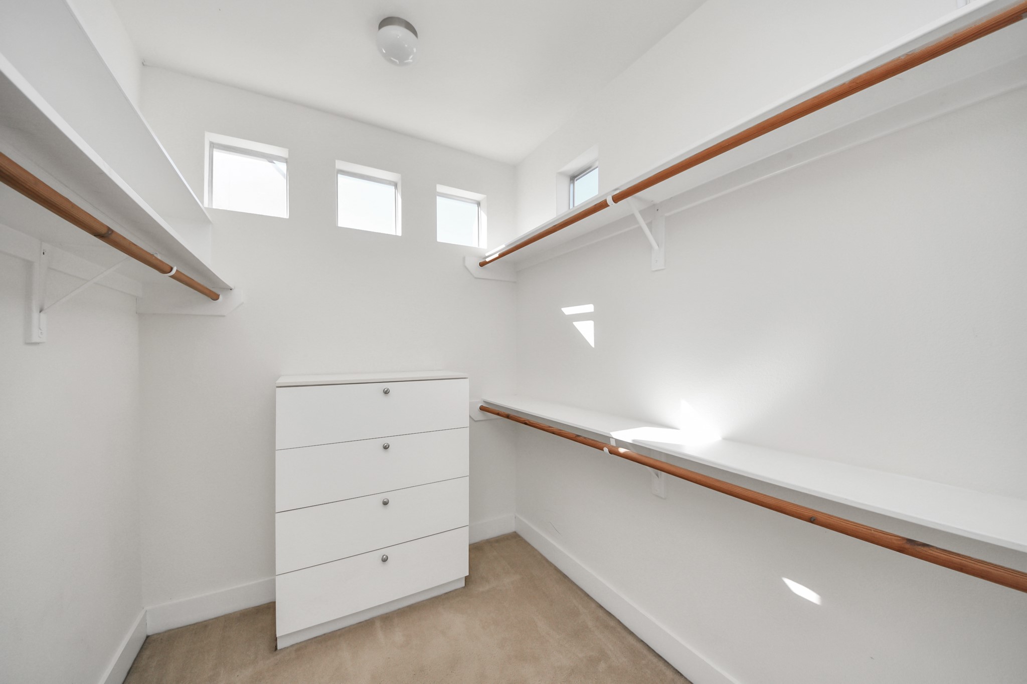 2436 Bissonnet Street, Unit 8 Houston, TX 77005 - Photo 34 of 42 a view of an empty walk in closet