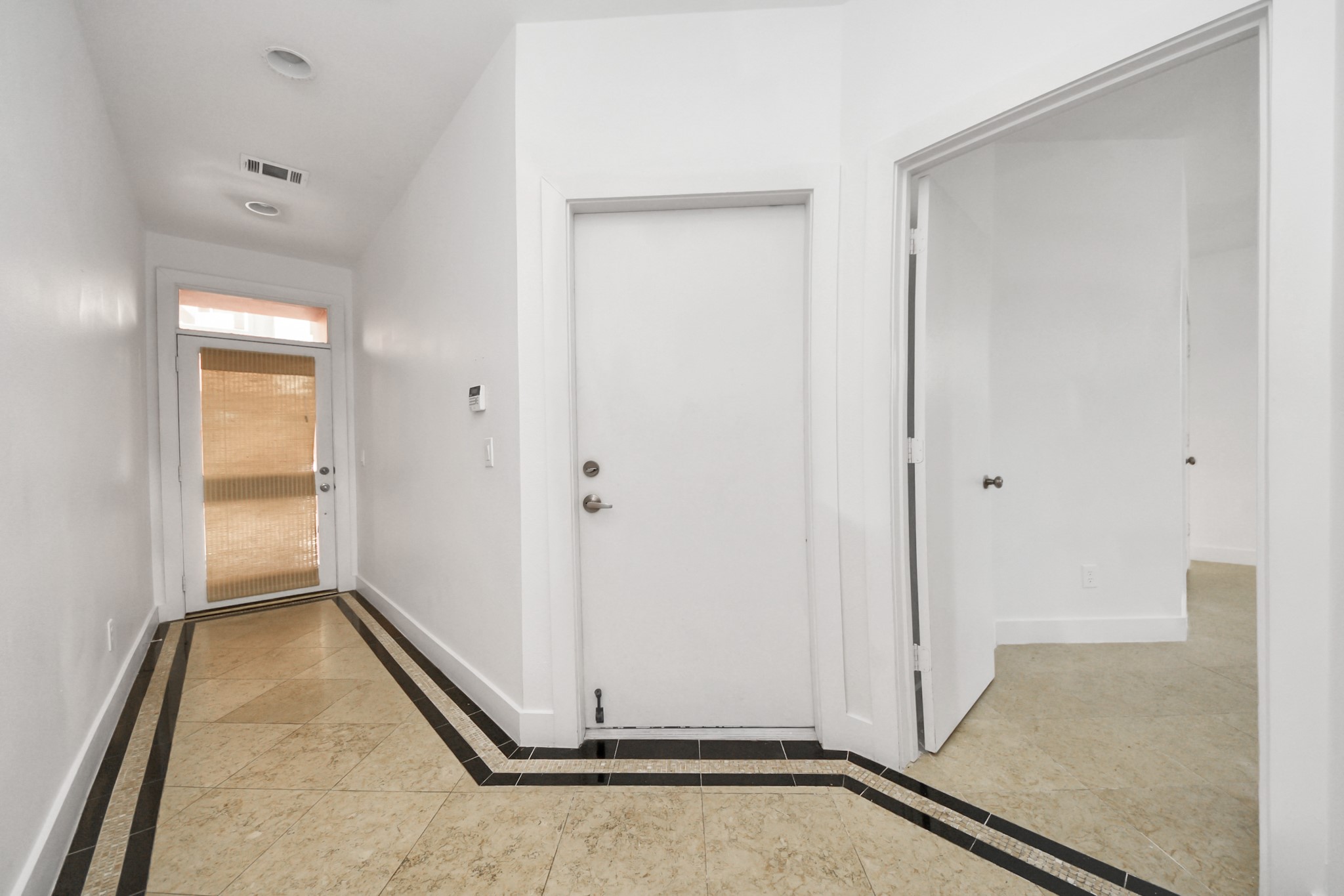 2436 Bissonnet Street, Unit 8 Houston, TX 77005 - Photo 8 of 42 an empty room with closet