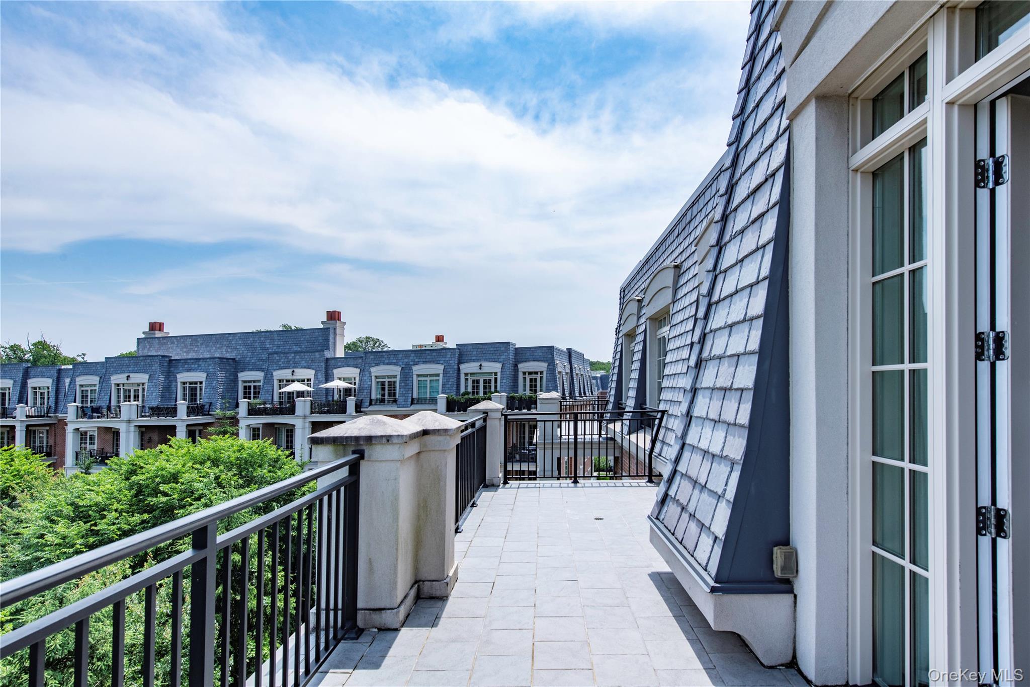 1000 Royal Court, Unit 1306 North Hills, NY 11040 - Photo 12 of 33 a view of city from balcony