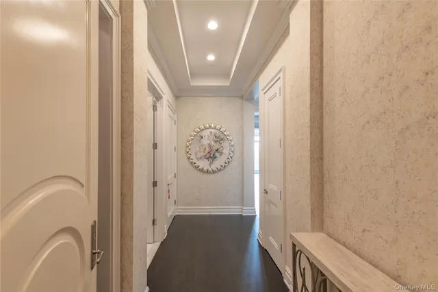 a view of room with window and hallway