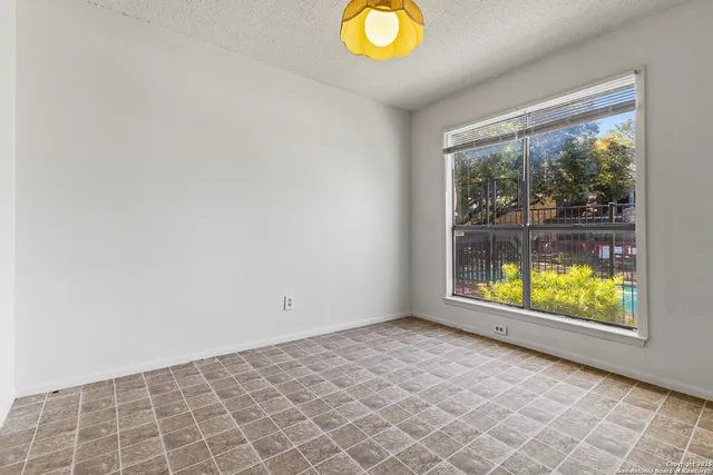 a kitchen with stainless steel appliances granite countertop a stove and a sink