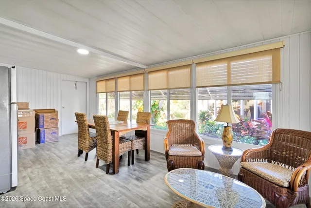 a dining room with furniture and mountain view