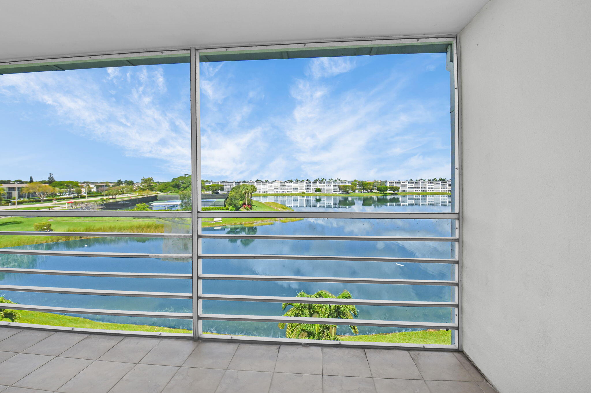 4088 Exeter Boca Raton, FL 33434 - Photo 23 of 48 Screened Patio w/Lake View