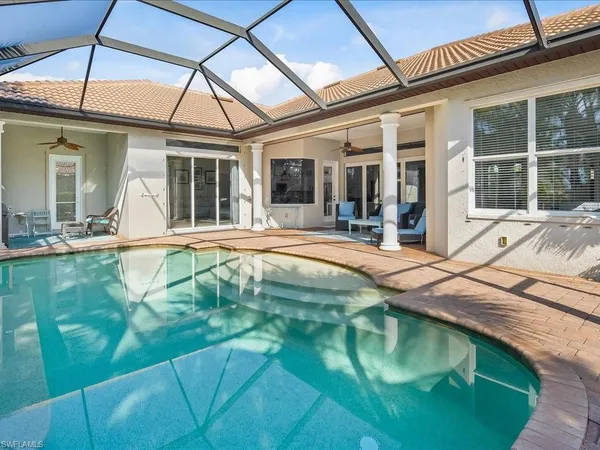 a view of pool with a patio