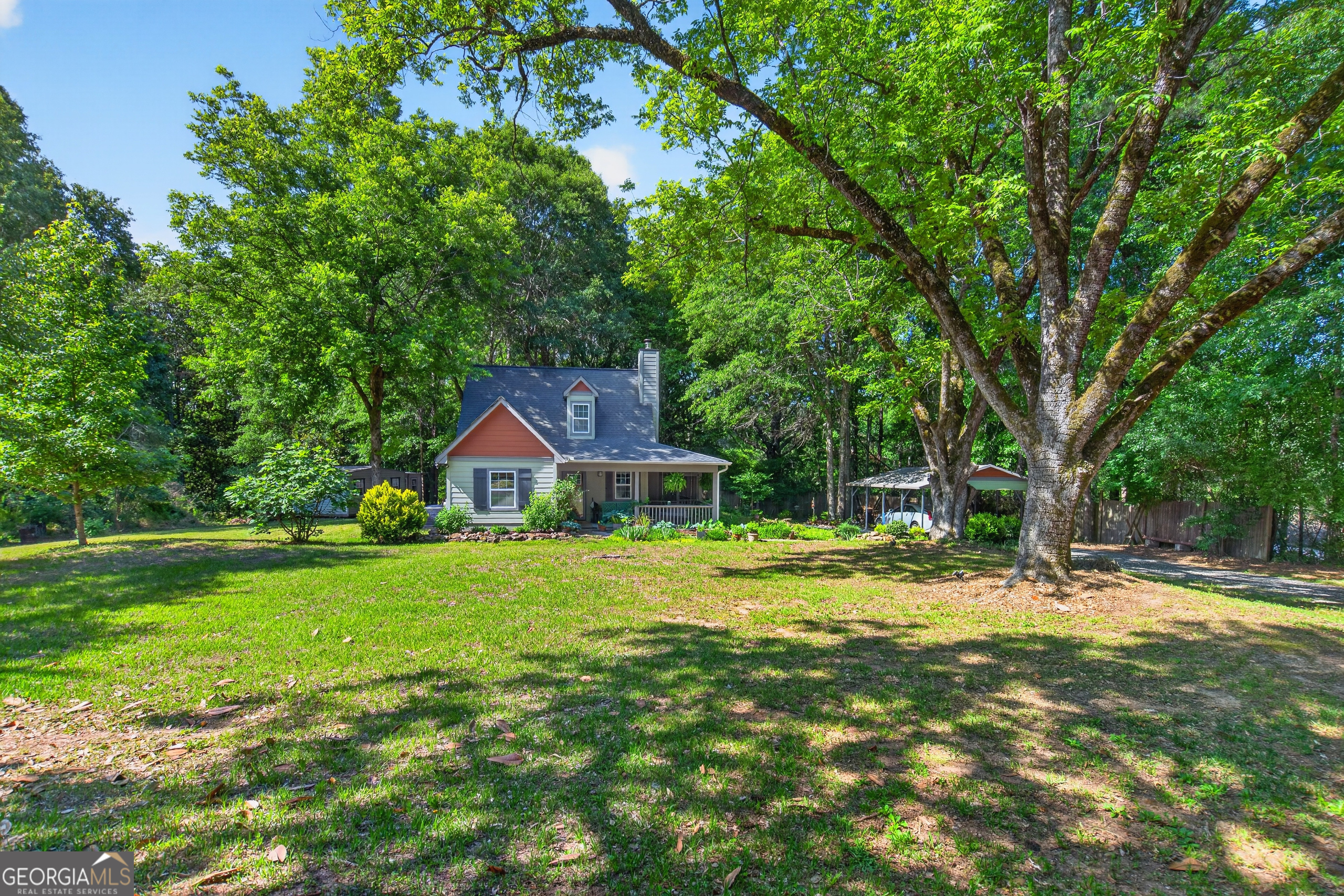 4656 Greenville Road LaGrange, GA 30241 - Photo 3 of 34 a front view of a house with a yard