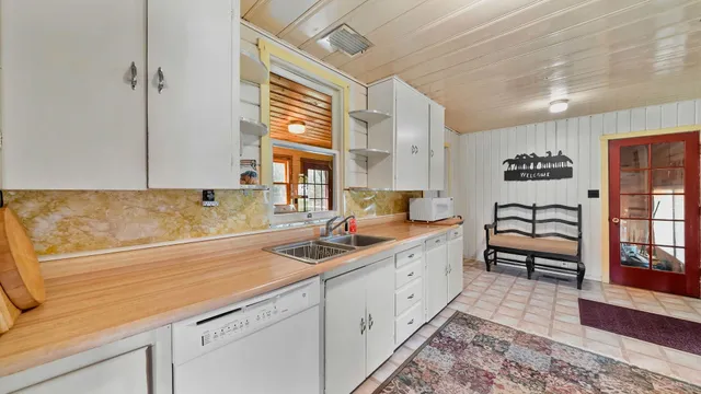 a view of a backyard with a garden