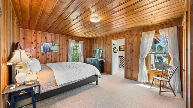 a view of swimming pool with a garden