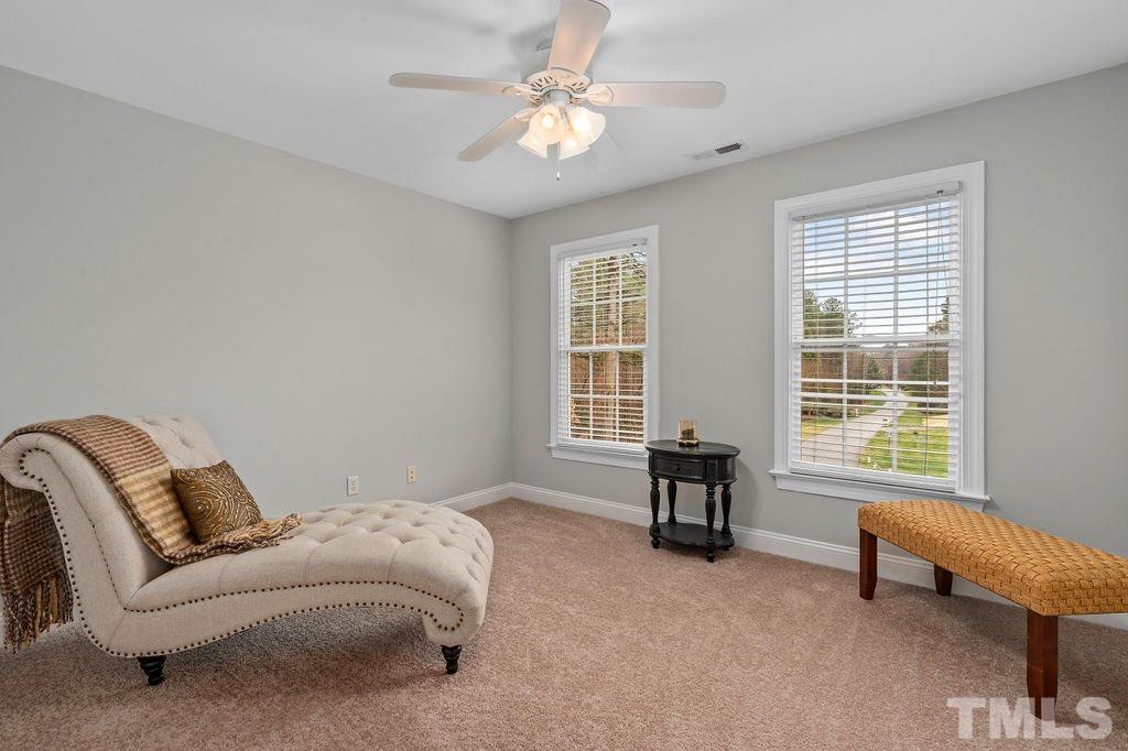 10400 Old Warden Road Raleigh, NC 27615 - Photo 17 of 30 a living room with furniture and two window