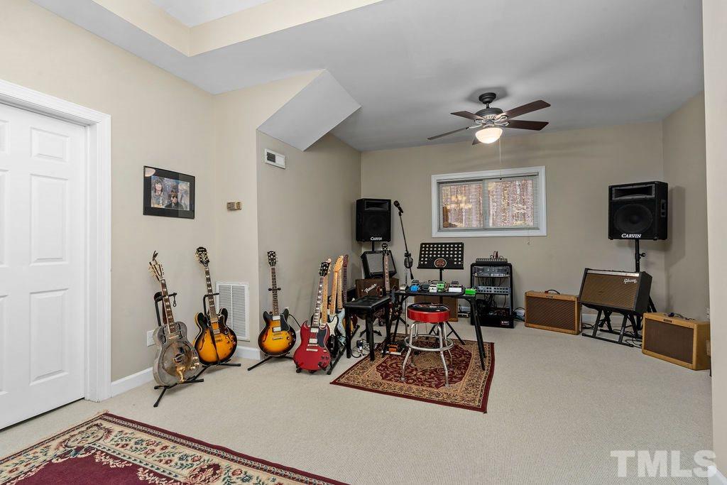 10400 Old Warden Road Raleigh, NC 27615 - Photo 25 of 30 a view of a room with gym equipment