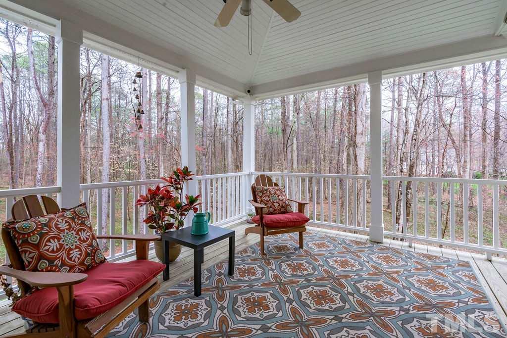 10400 Old Warden Road Raleigh, NC 27615 - Photo 28 of 30 a outdoor living space with furniture and a potted plant