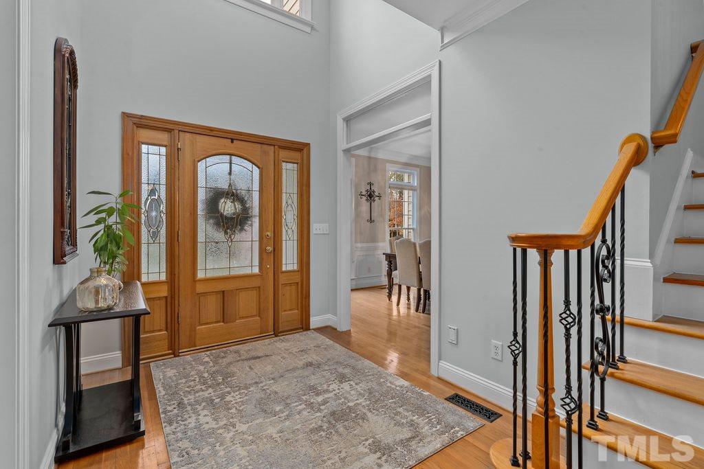 10400 Old Warden Road Raleigh, NC 27615 - Photo 5 of 30 a view of a livingroom from a hallway