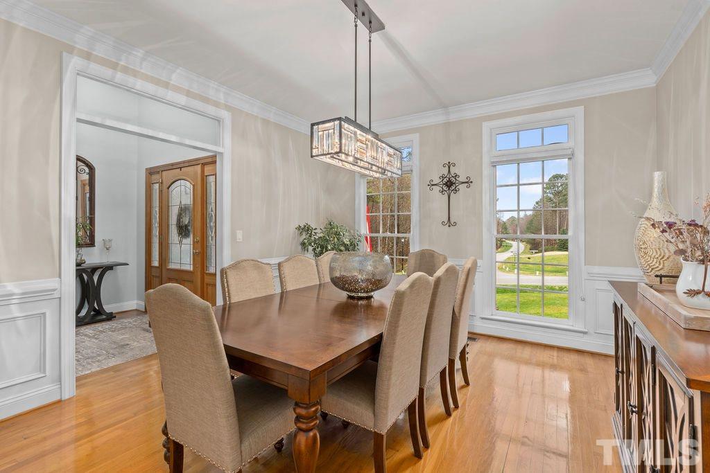 10400 Old Warden Road Raleigh, NC 27615 - Photo 7 of 30 a dining room with furniture and window