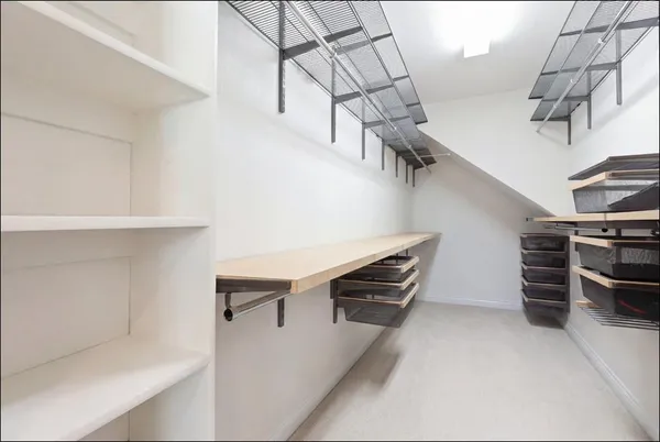 a view of storage and utility room with racks