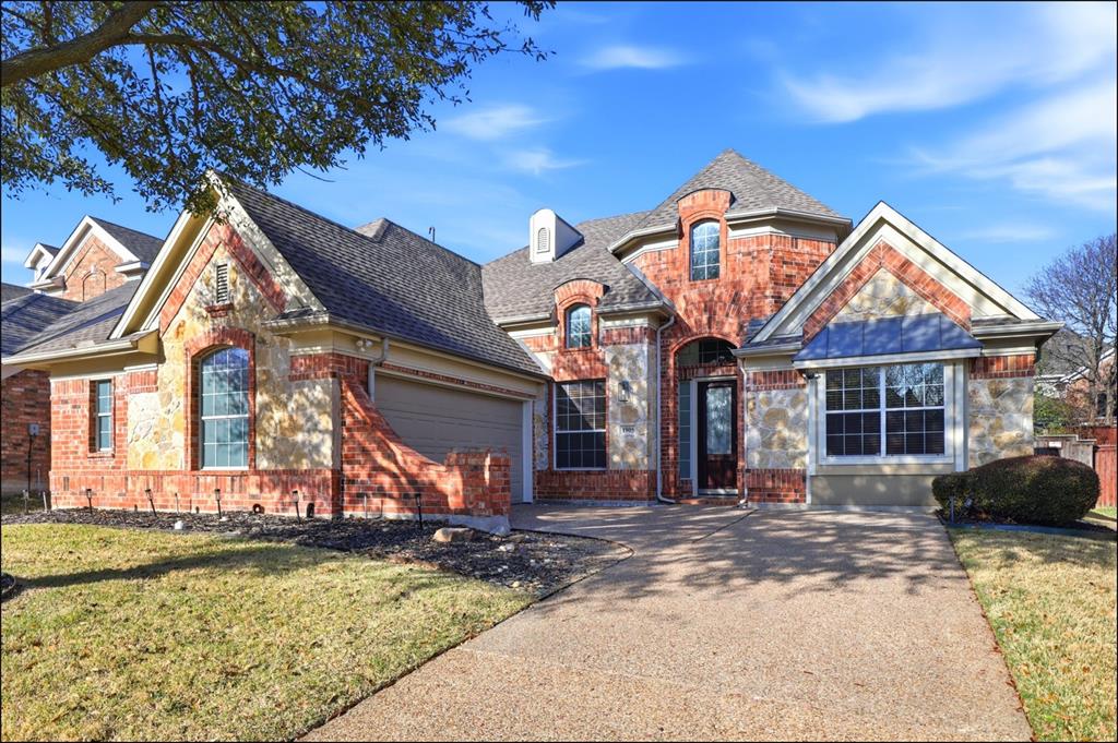 1905 Natchez Trace Allen, TX 75013 - Photo 2 of 26 a front view of a house with a yard outdoor seating and entertaining space