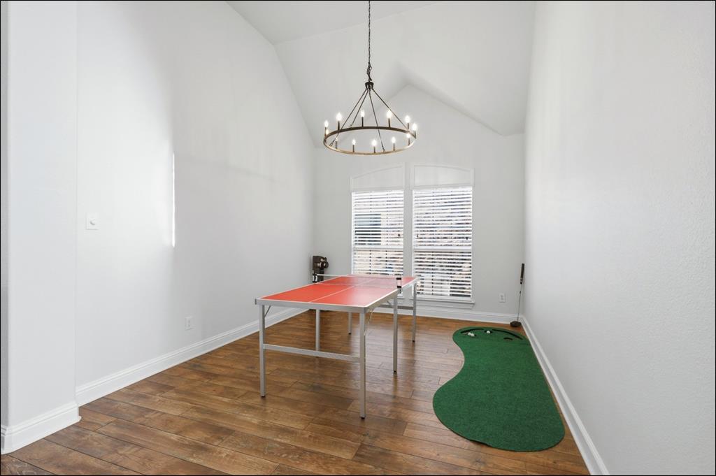 1905 Natchez Trace Allen, TX 75013 - Photo 5 of 26 a view of a room with wooden floor table and chairs