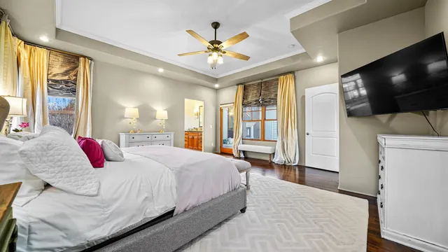 a large kitchen with stainless steel appliances a sink stove and cabinets