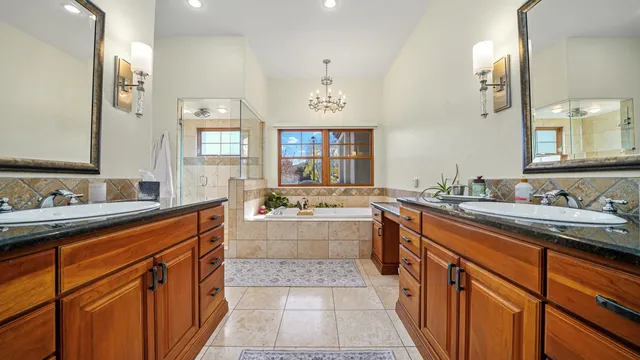 a bathroom with a bathtub and a sink
