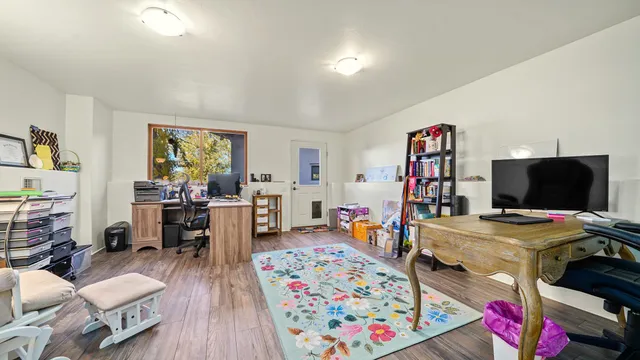 a living room with furniture and a table