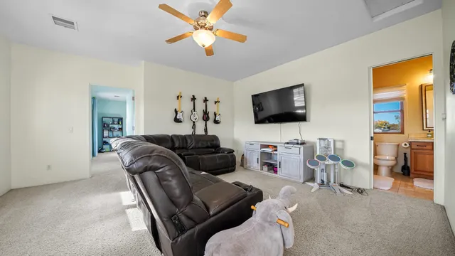 a bedroom with a bed furniture and a window