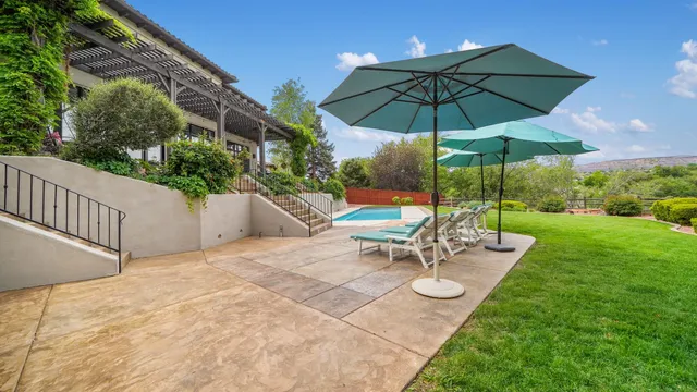a view of yard with patio and outdoor seating
