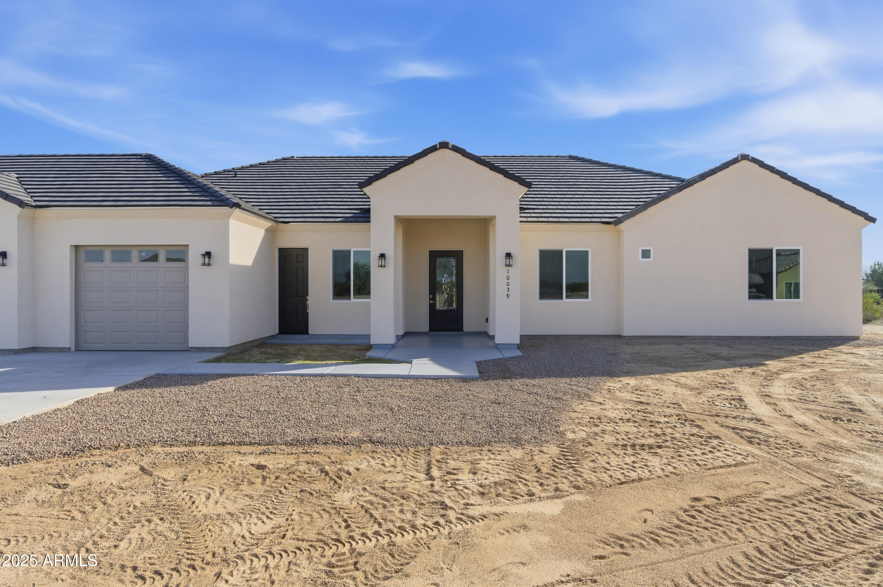 10039 North Burris Road Casa Grande, AZ 85122 - Photo 4 of 61 a view of a house with a yard