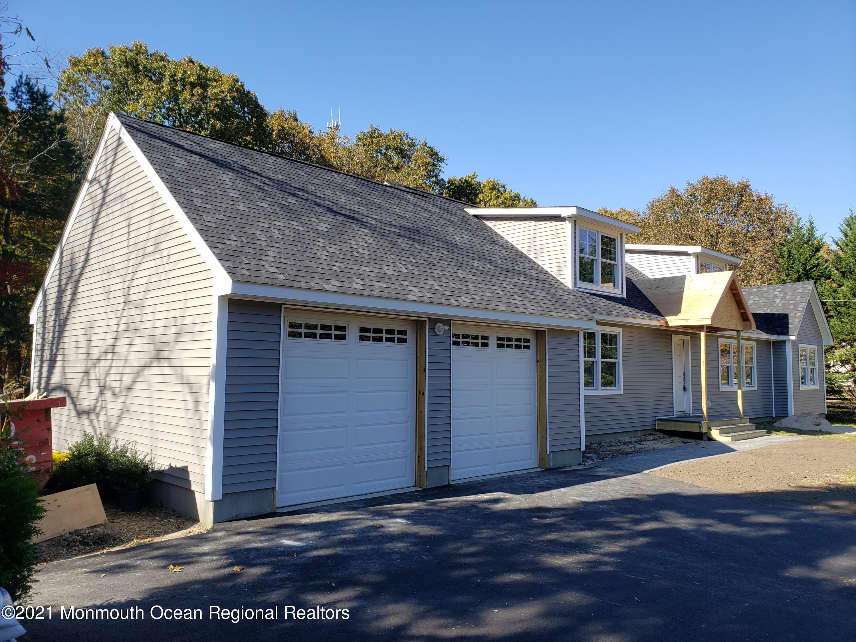 154 Jackson Mills Road Freehold, NJ 07728 - Photo 2 of 19 a view of a house with a yard