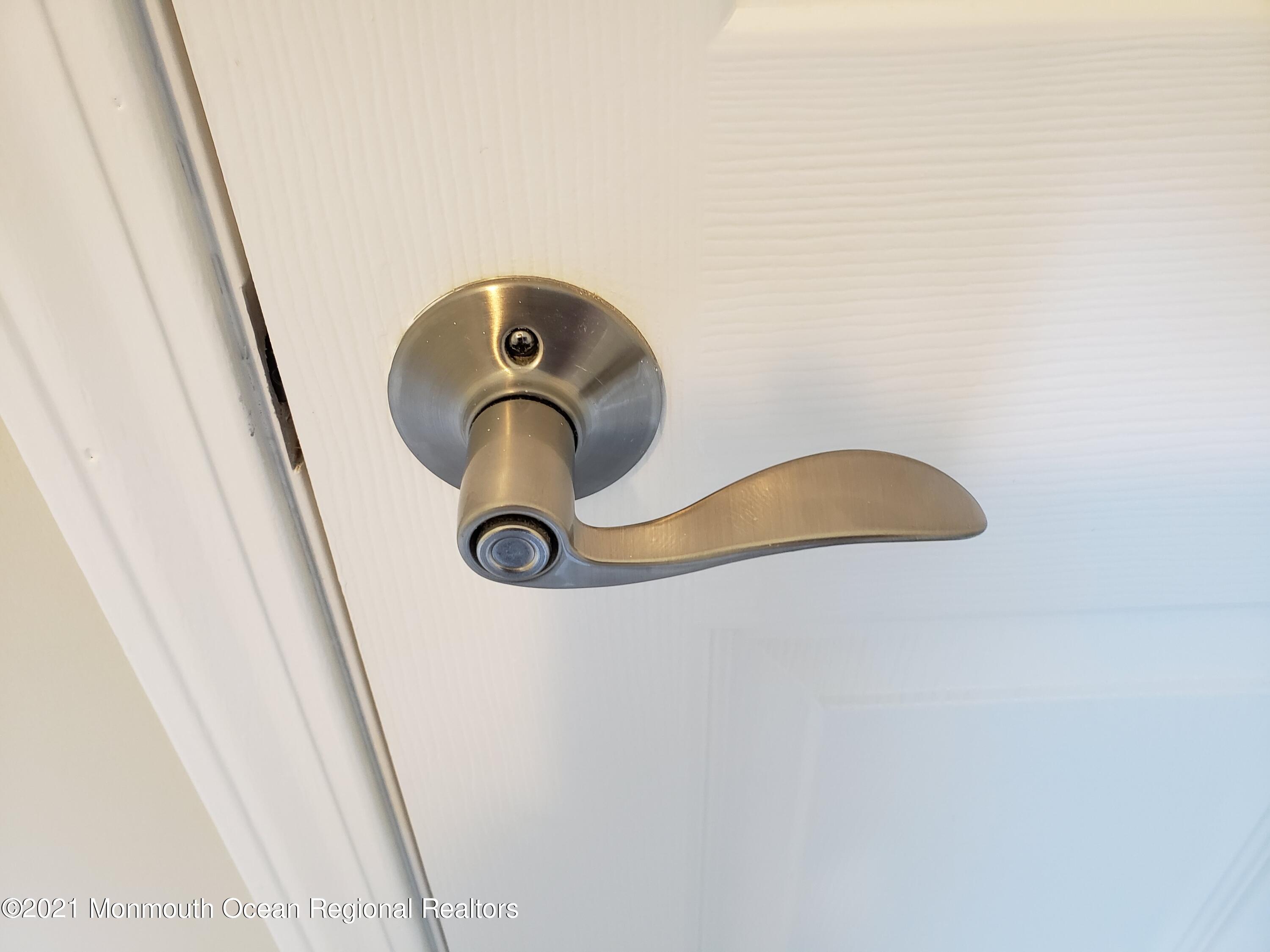 154 Jackson Mills Road Freehold, NJ 07728 - Photo 11 of 19 a close view of cabinet door