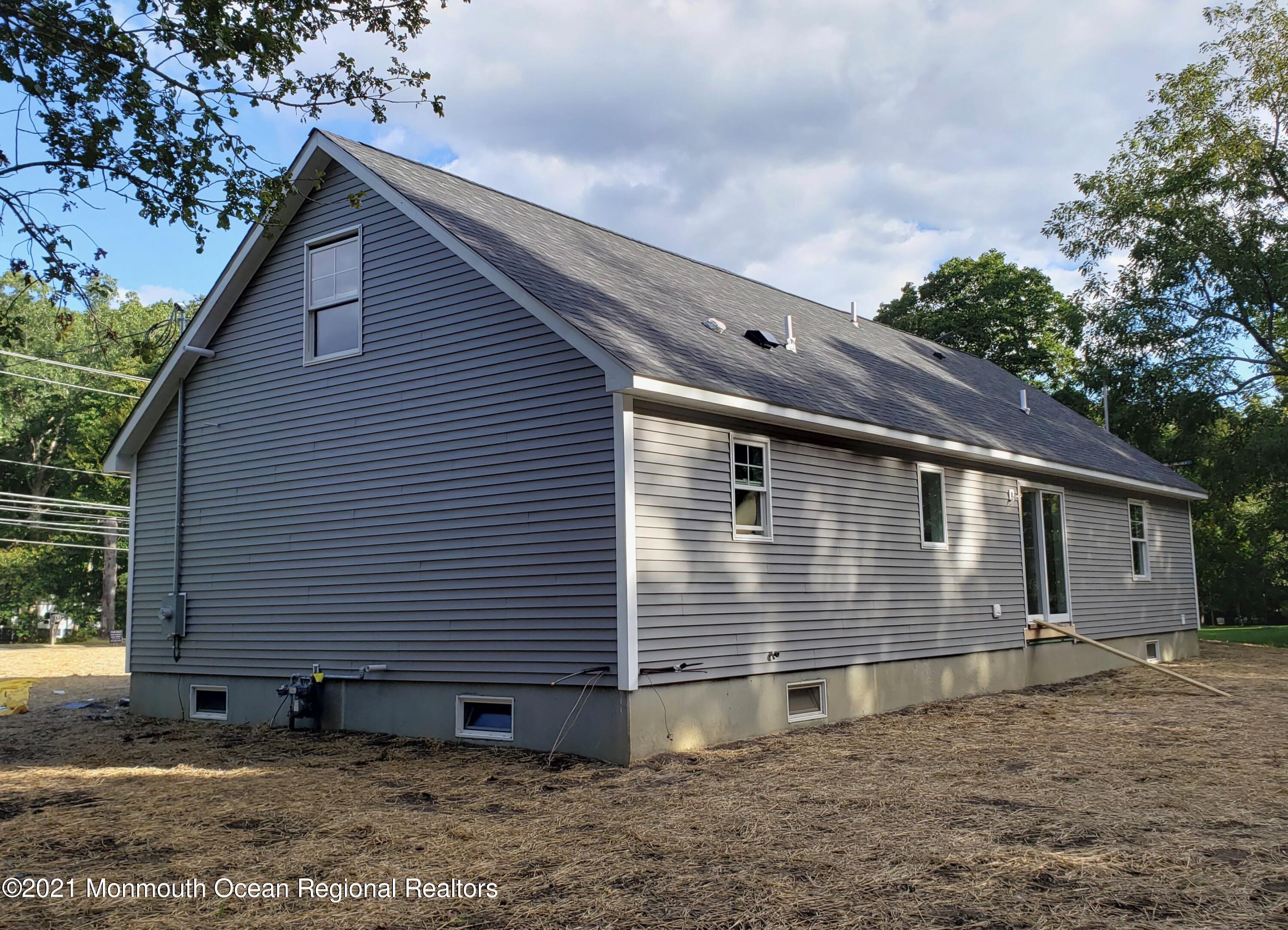 154 Jackson Mills Road Freehold, NJ 07728 - Photo 3 of 19 a view of a house with a yard