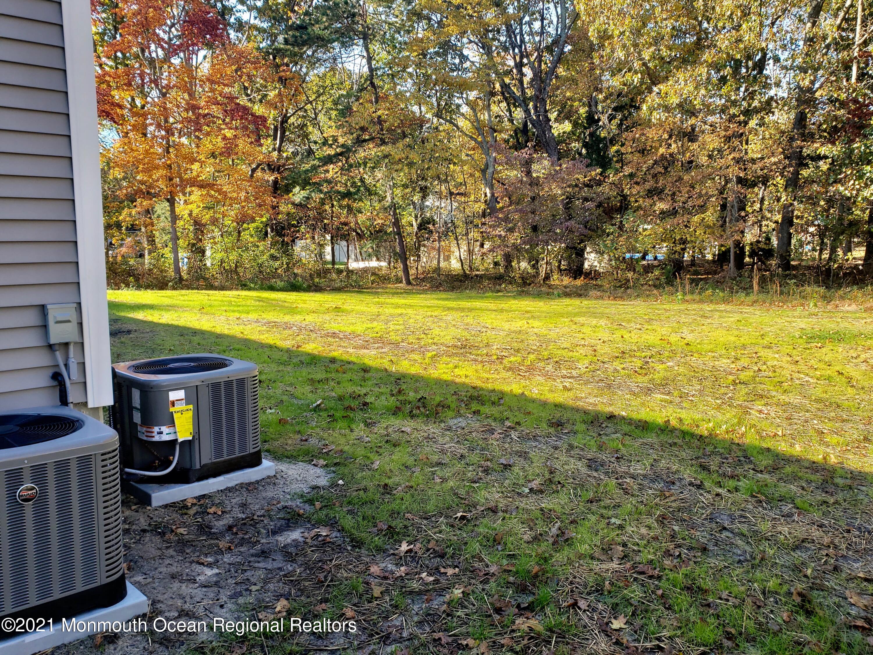 154 Jackson Mills Road Freehold, NJ 07728 - Photo 4 of 19 a view of outdoor space with swimming pool