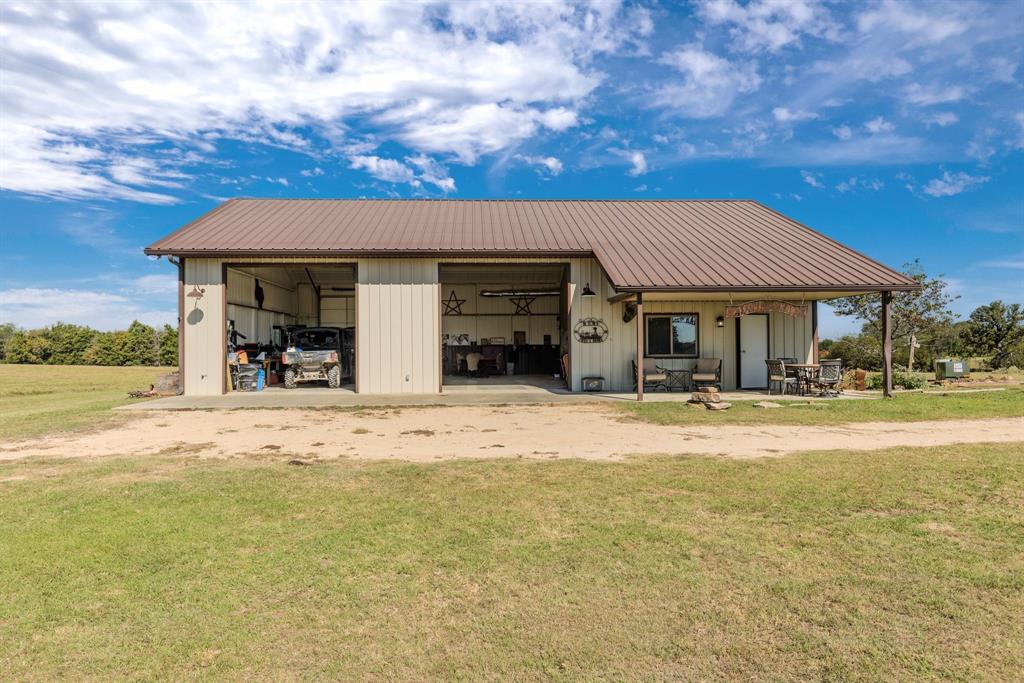 1094 Southwest Sw Cr Saltillo, TX 75478 - Photo 6 of 39 a view of a house with a swimming pool and a chairs