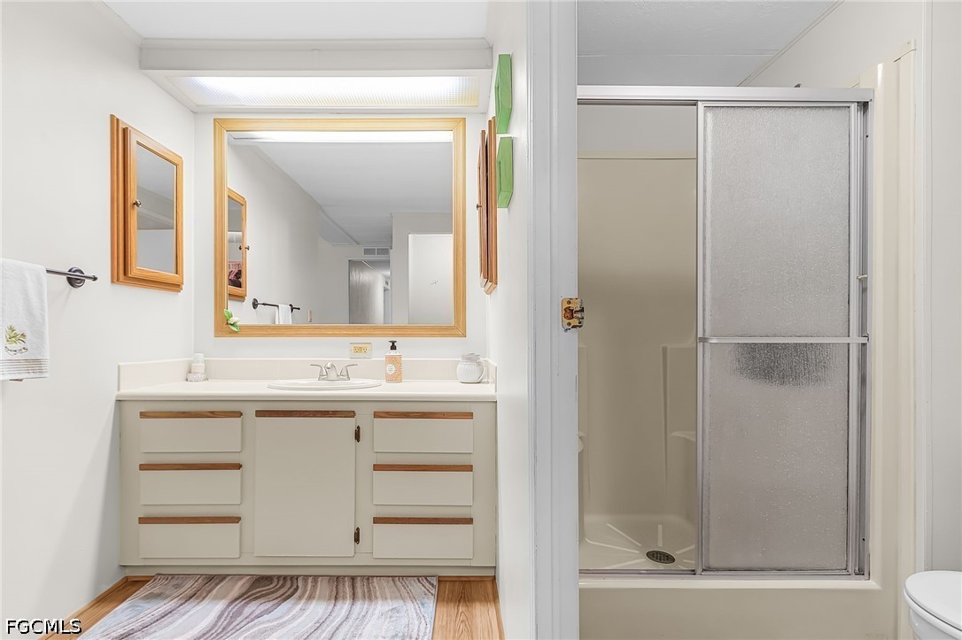 5 Erica Street Alva, FL 33920 - Photo 12 of 37 a bathroom with a sink and a mirror