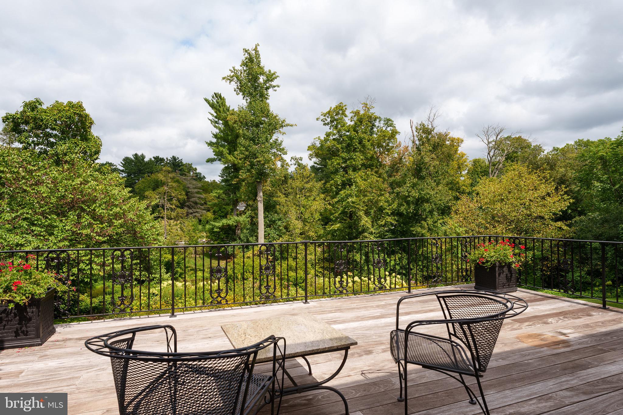 21 Russell Road Princeton, NJ 08540 - Photo 19 of 50 a view of chairs and table in the lake