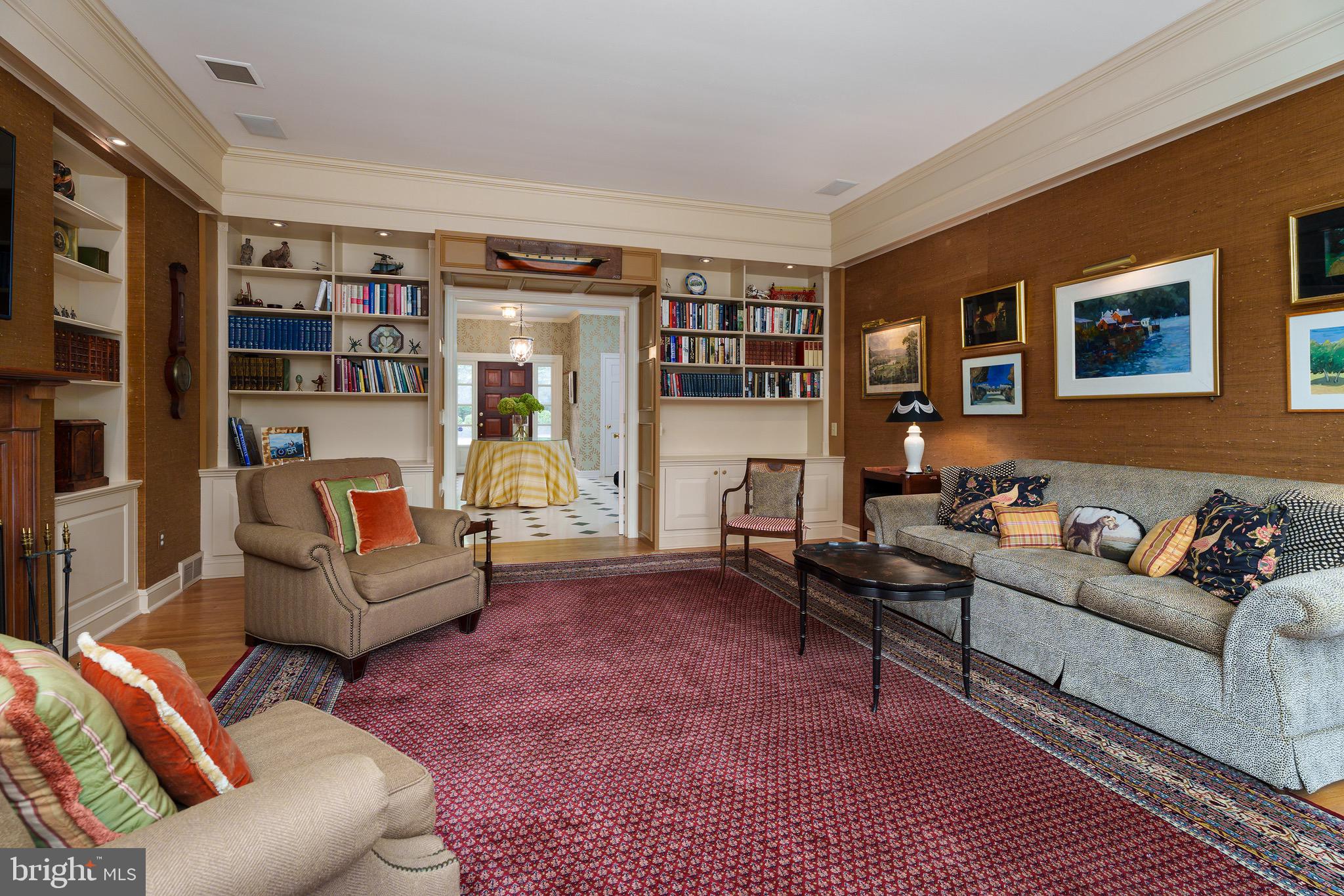 21 Russell Road Princeton, NJ 08540 - Photo 22 of 50 a living room with furniture and a book shelf