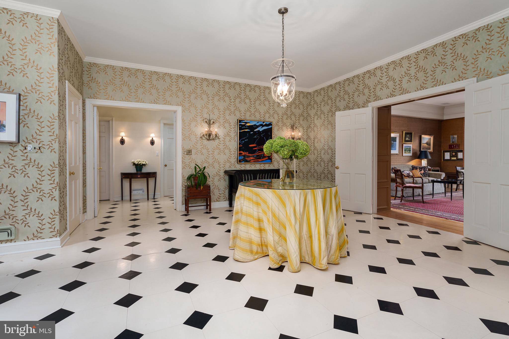 21 Russell Road Princeton, NJ 08540 - Photo 23 of 50 a living room with a black white checkered floor with couches and a coffee table