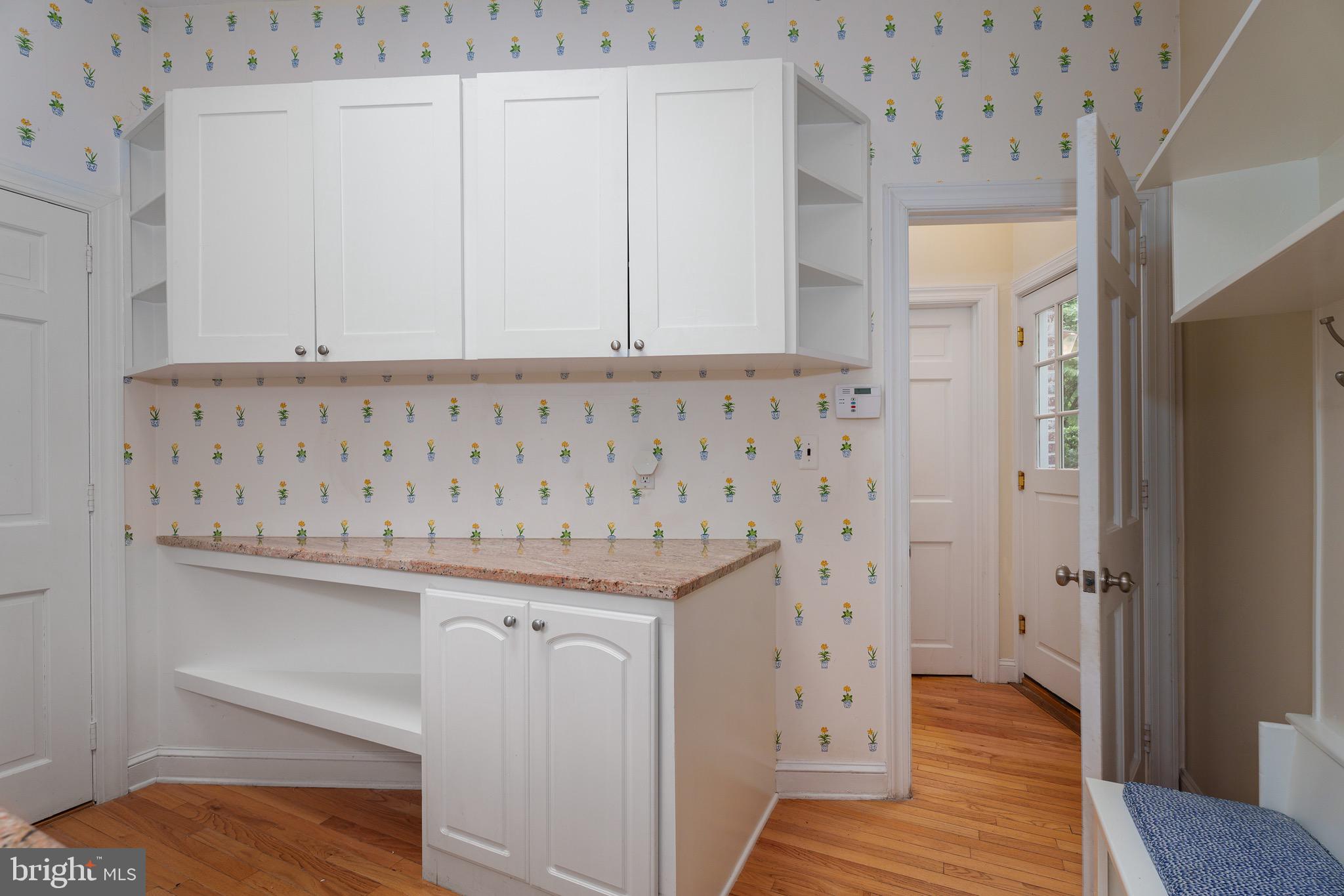 21 Russell Road Princeton, NJ 08540 - Photo 38 of 50 a view of a hallway with wooden floor and cabinet
