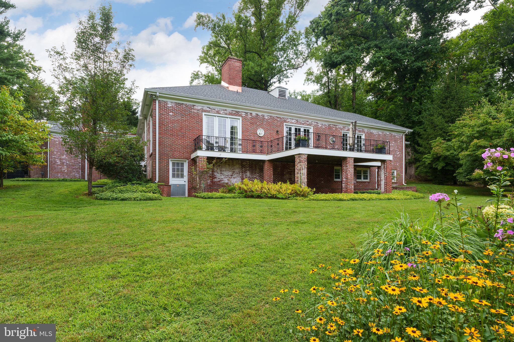 21 Russell Road Princeton, NJ 08540 - Photo 44 of 50 a view of an house with backyard space and balcony