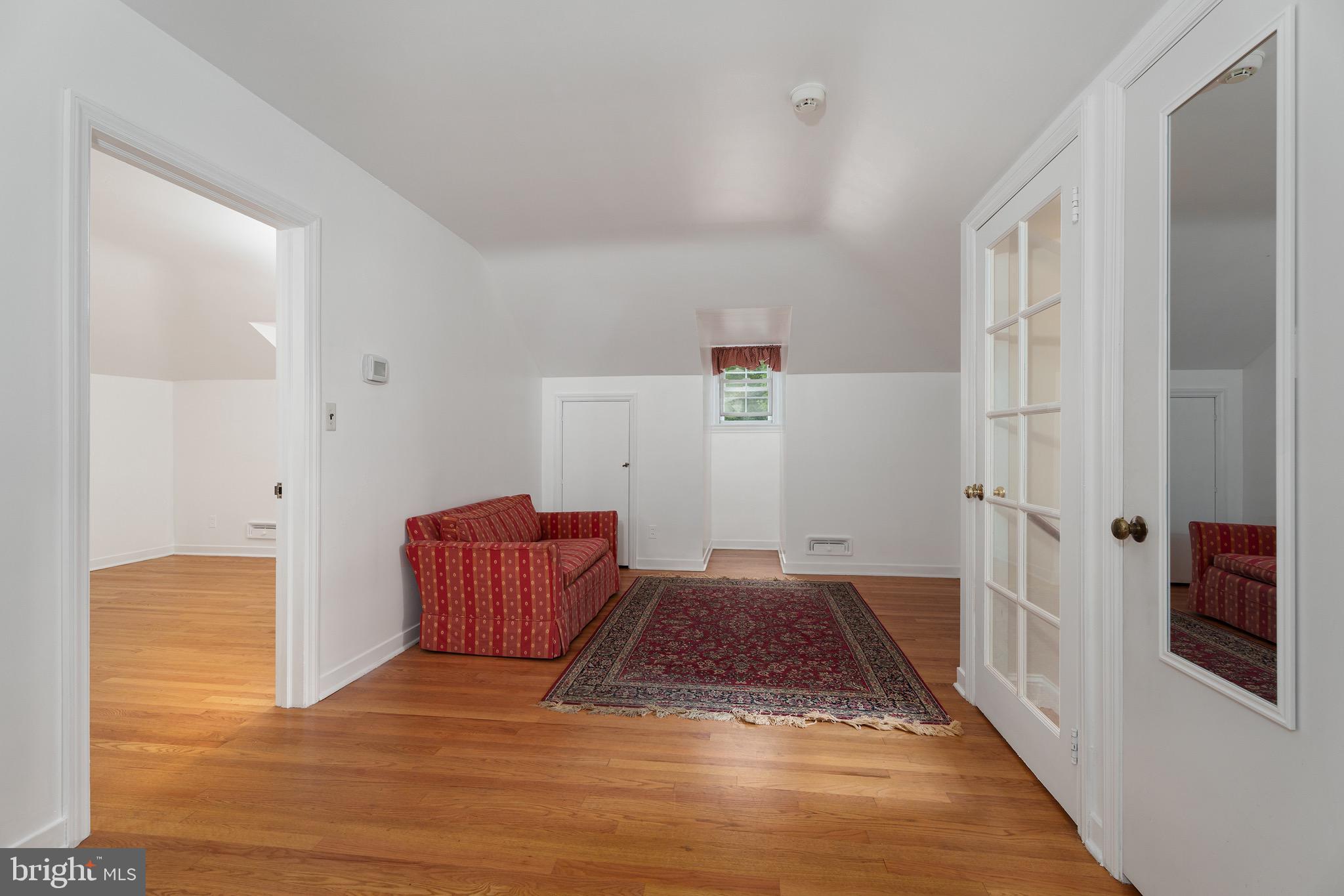 21 Russell Road Princeton, NJ 08540 - Photo 46 of 50 a view of hallway with rug and wooden floor
