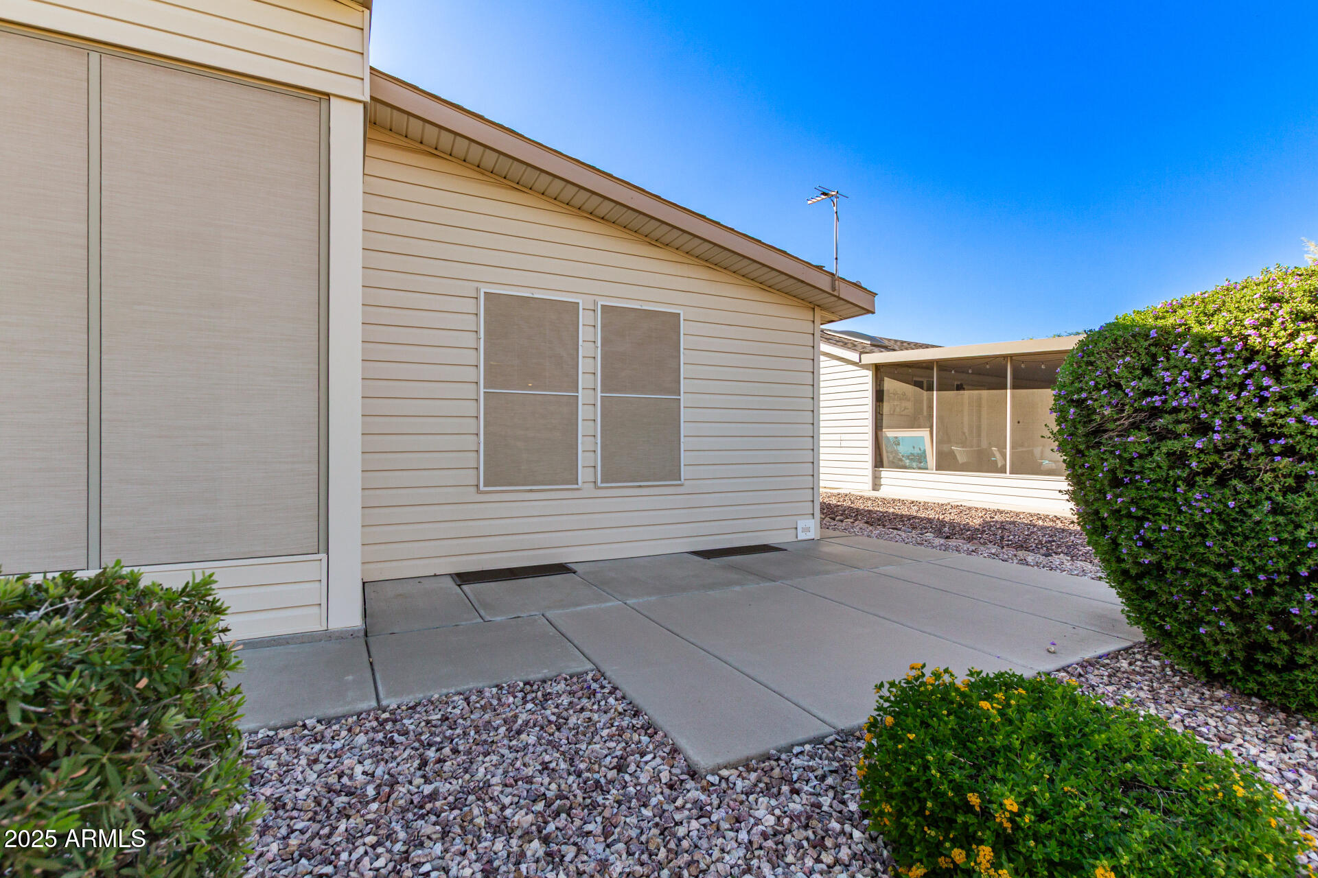 3301 South Goldfield Road, Unit 2097 Apache Junction, AZ 85119 - Photo 23 of 40 a view of house with backyard