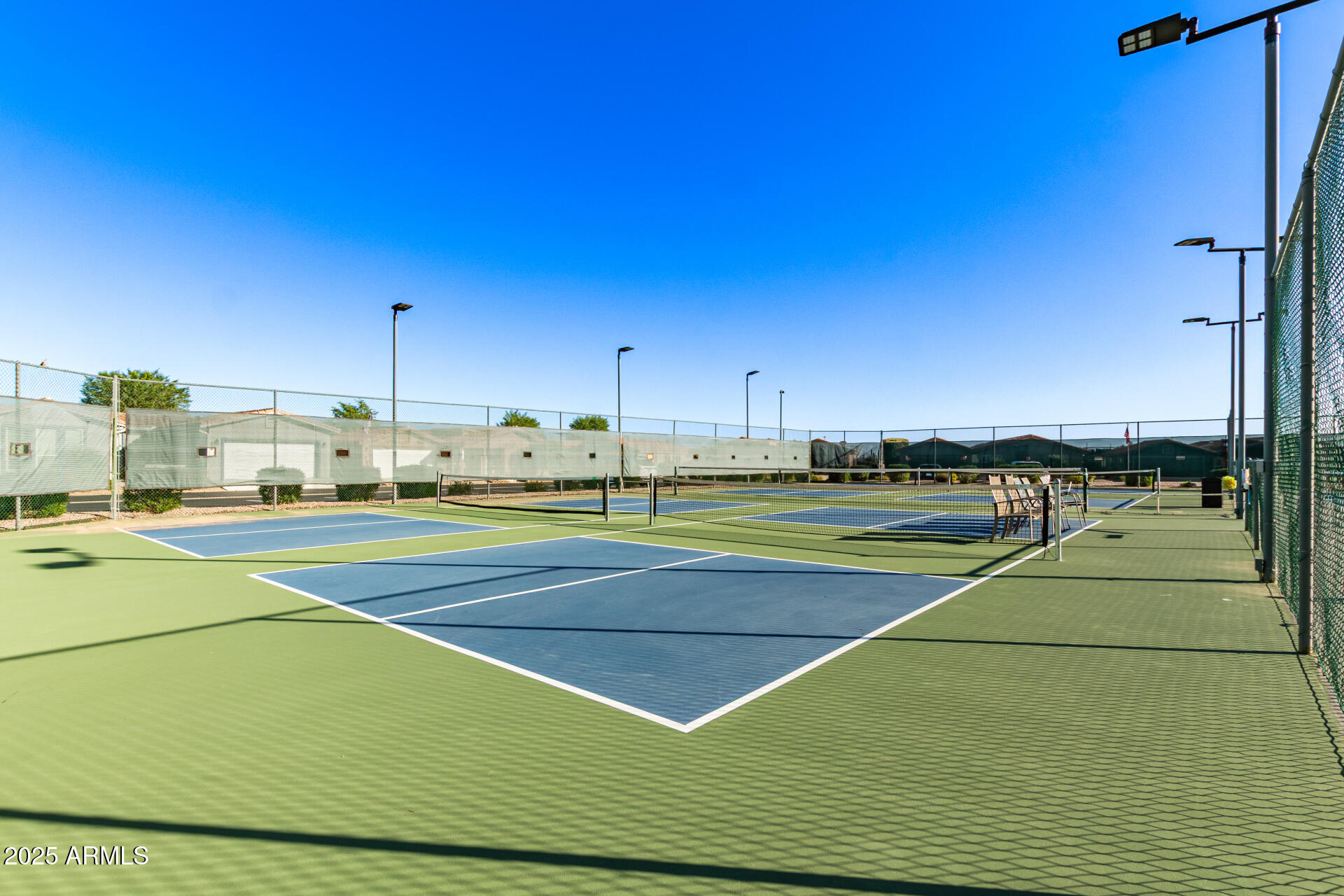 3301 South Goldfield Road, Unit 2097 Apache Junction, AZ 85119 - Photo 28 of 40 a view of a tennis court