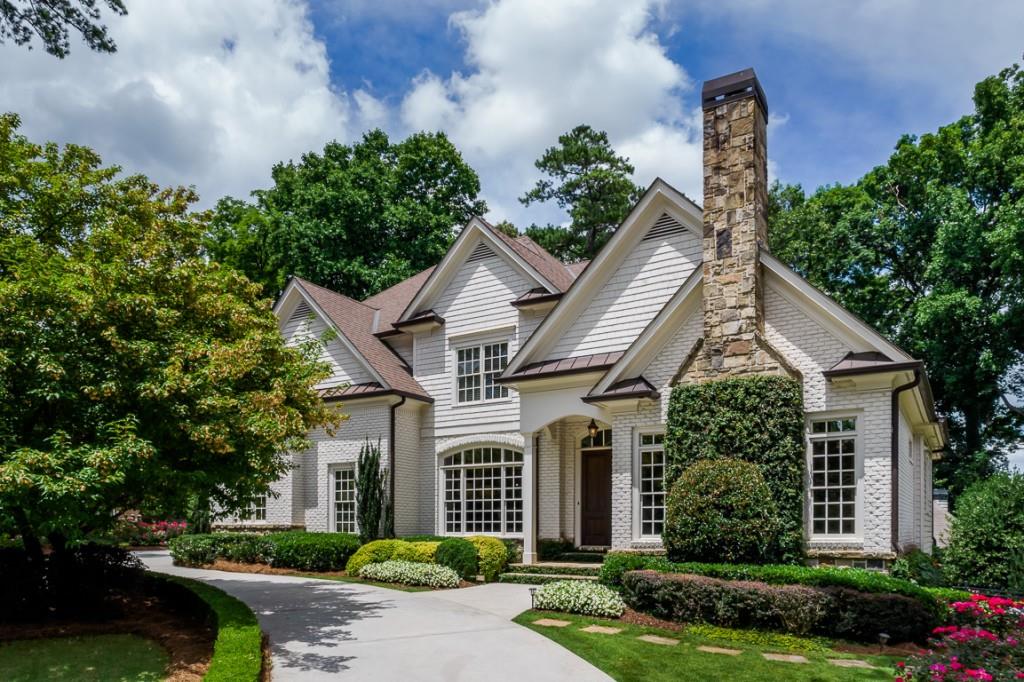 front view of a house with a yard