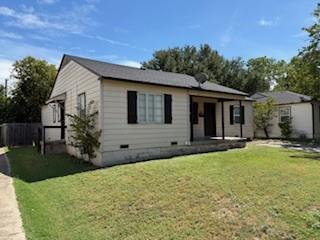502 Northeast 19th Street Grand Prairie, TX 75050 - Photo 3 of 30 a view of a house with backyard and sitting area