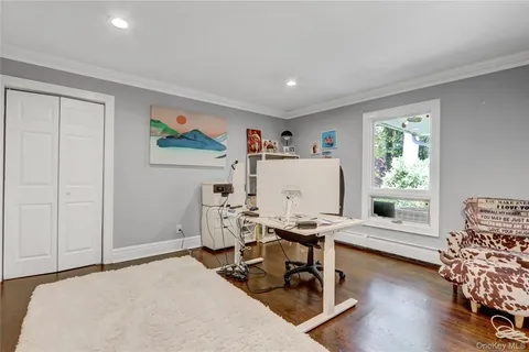 a workspace with furniture and window