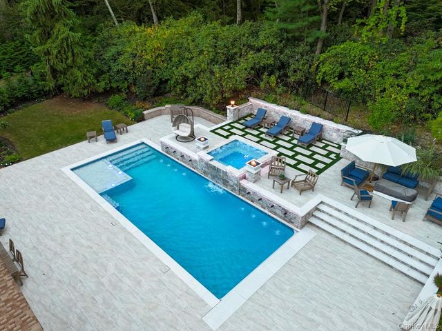 a view of a chairs and table in the terrace