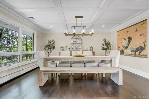 a view of living room with furniture and window