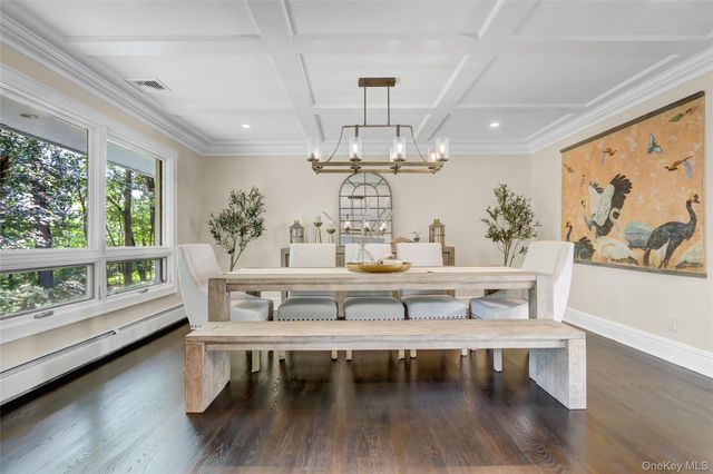 a view of living room with furniture and window