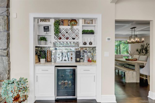 a kitchen with stainless steel appliances a stove and more cabinets