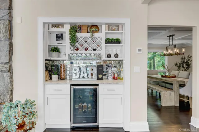 a kitchen with stainless steel appliances a stove and more cabinets